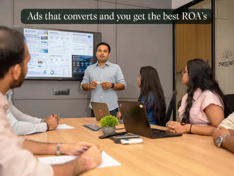 PPC: Ad campaign results presented in a meeting. Caption: Ads that convert and get you the best ROAS.